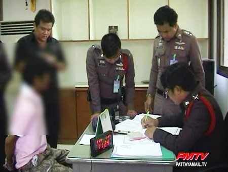 The young man is charged at the police station